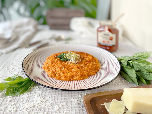 risotto cremoso con tomate